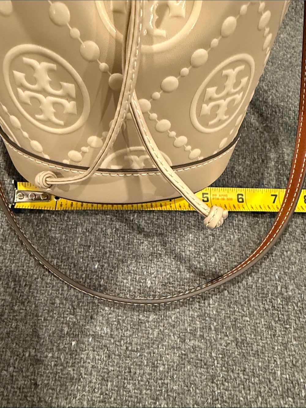 Tory Burch Beige Embossed Monogram Mini Bucket Bag - Picture 10 of 11
